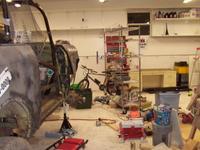 Looking down the passenger side at the toolchest, desk, and parts washer