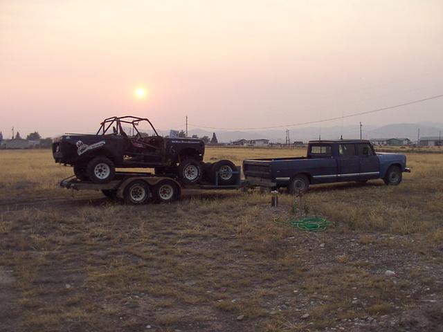 Racer and 4dr, parked behind the house, near the west edge of the property, by the well (handy for using the pressure washer)