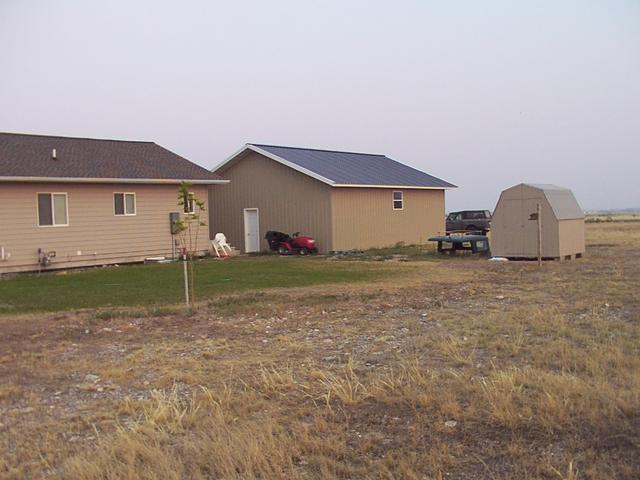 Looking south/south-east, you see the house, garage, riding tractor, shed, with Oscar's hardtop and Tigger viewable.