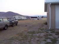 Gap between BUGM/Oscar and the work-stall of the shop.  The truck n' trailer usually park here.