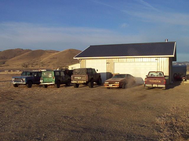 Line-up from the end of the driveway.  Travelette, Oscar, Tigger, Laser, Michelle's Toy pickup.  Two motion lights - one between