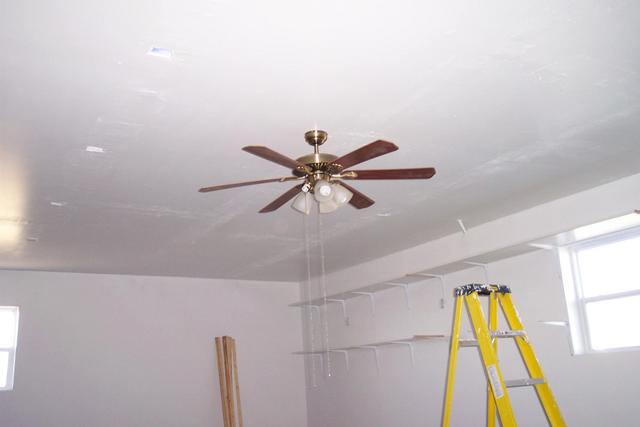 4/26 - Ceiling fan and lights mounted and wired on 4/25.  The first hard-wired always-ready lights in the shop.  Oh, and the fan