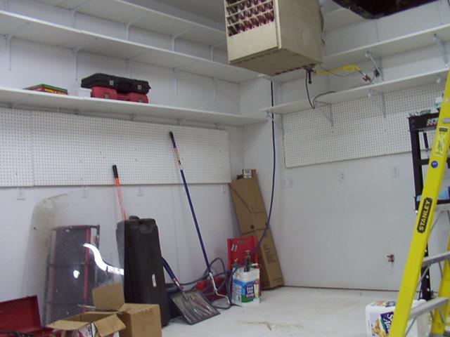 Pegboard up, lots of shelving - but never enough