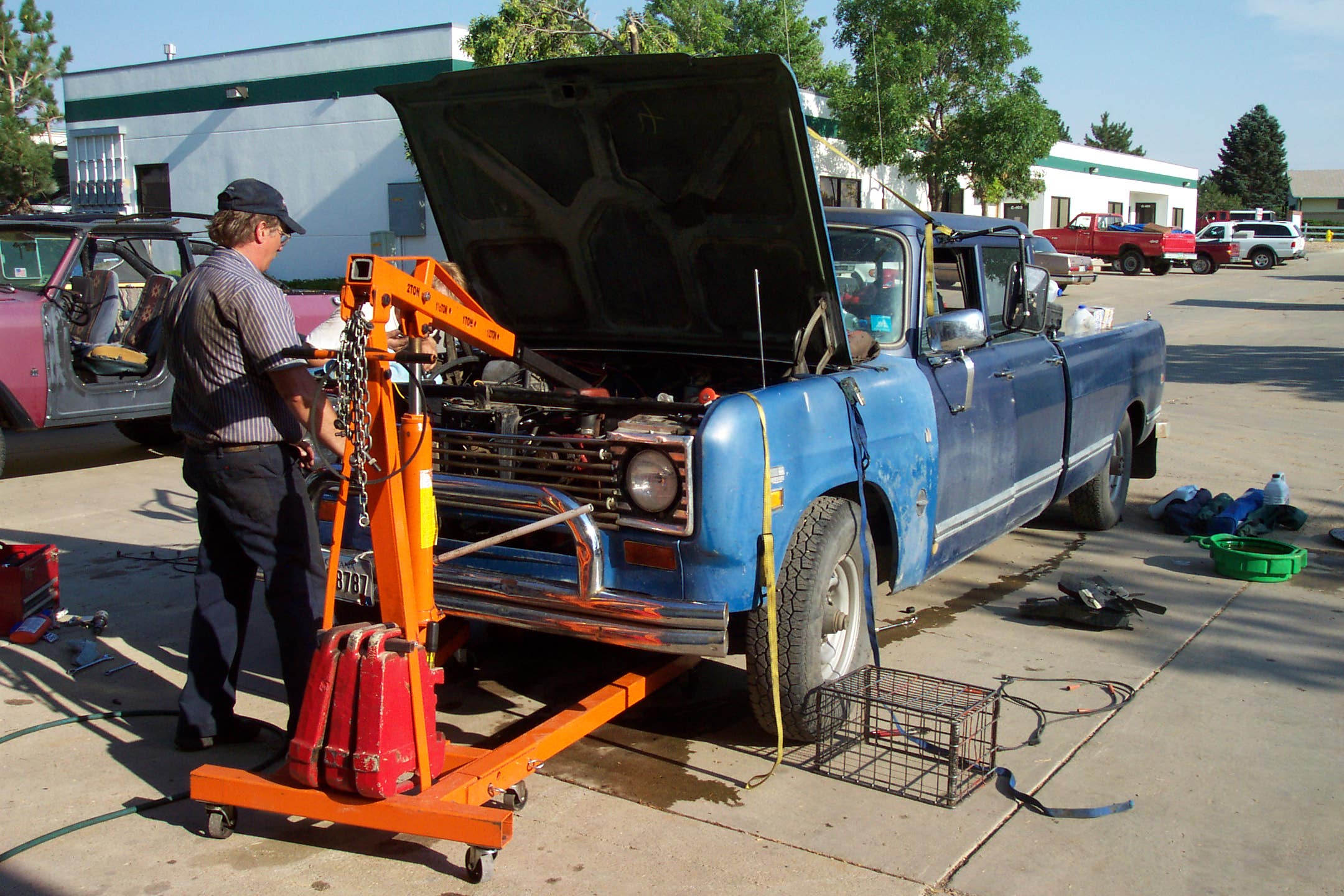 John Comer supervising the installation of the loaner.