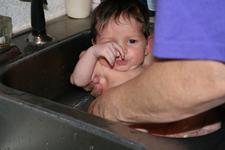 Joleigh's first bath in Gram's sink