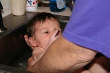 Joleigh's first bath in Gram's sink