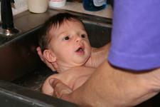 Joleigh's first bath in Gram's sink