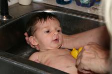 Joleigh's first bath in Gram's sink