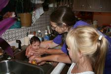 Joleigh's first bath in Gram's sink