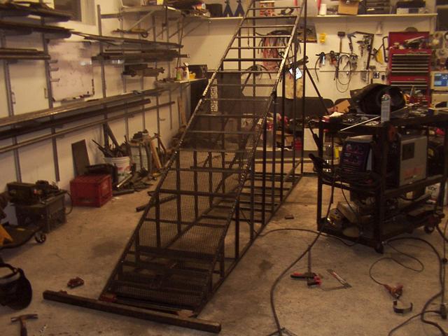 10/8 - mid-diagonal in place, rear supports in place, first section of expanded steel welded down the right side only.