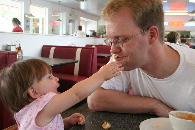 Lunch at the Moab Diner - Joleigh feeds Dad some of her left over grilled cheese