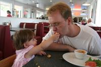 Lunch at the Moab Diner - Joleigh feeds Dad some of her left over grilled cheese