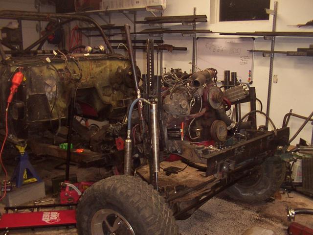 Front suspension drooping, thanks to the Hi-Lift on the pass side, and a floor jack between the spring and frame on the driver's