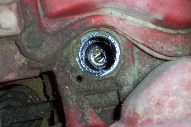 View down the disty hole - you can see the oil pump (slotted) and a bronze bushing