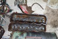 Pushrods and rocker arms in the valve covers