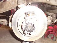 Remove the allen screws retaining the hub dial