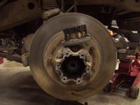 Remove the allen screws retaining the hub dial