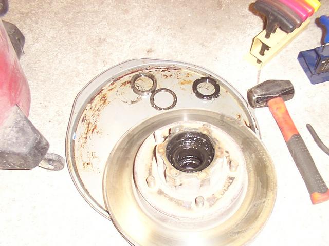 Then remove the lock nut, washer, and nut