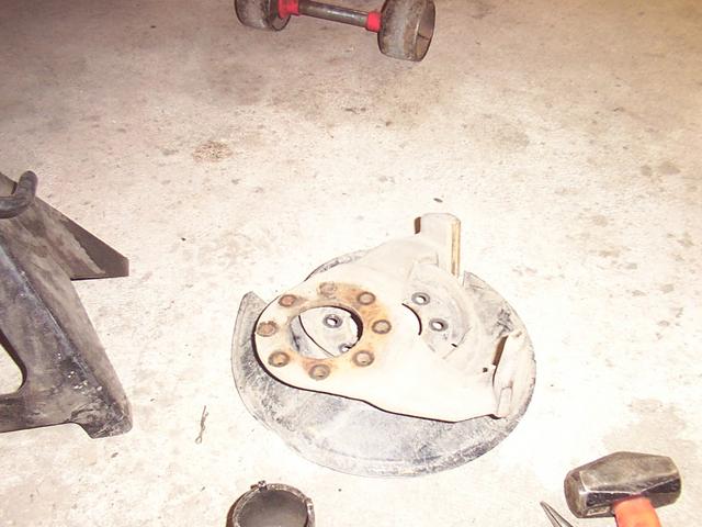 Remove the caliper stand and dust shield