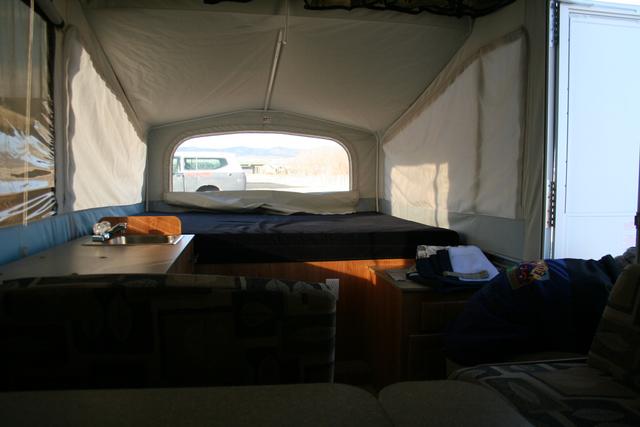 Sitting on rear bunk, looking towards front