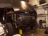 Front bumper tacked in place