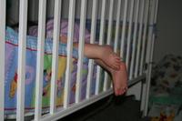 August 7th, 2007 - Feet hanging out of crib