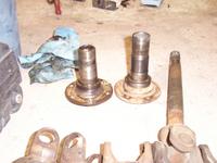 Stock drum spindle on left, Chevy small-bearing spindle on right