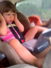 Joleigh (35 months) watching Dora in the back seat of the Scout