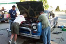 Mark Korsten, Tom, and Robert Searles finish up the install.