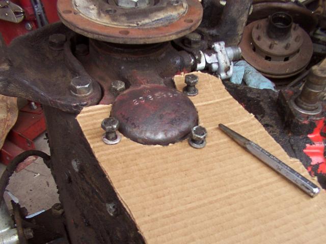 Making my cardboard template for the tailhousing transmission mount bracket using cardboard.