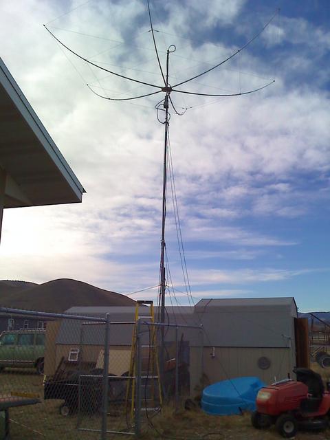 11-05-09_1321 Raising the antenna on a 40' push-up mast