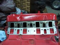 4/21 IC 392 head, LPG 345 intake gasket with exhaust cross-over block in the center.