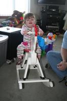 03262010 Audrey on the Rocking Horse and Joleigh still has her teeth