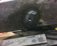 Drain plug hole - 3/8&quot; strap welded to 3/16&quot; tubing with a 1/4 NPT hole